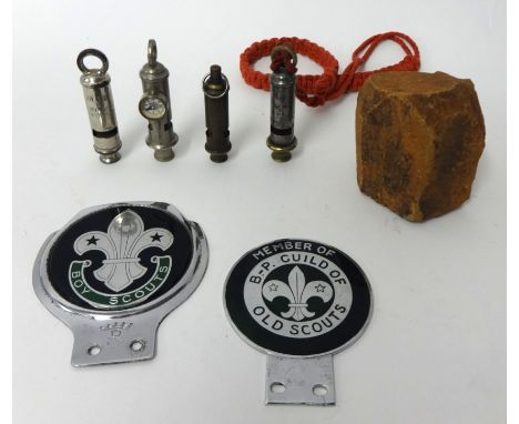 Piece of Red Rock from Mafeking brought home by a Boer War soldier, four whistles including ACME, EMCA and Girl Guide and two