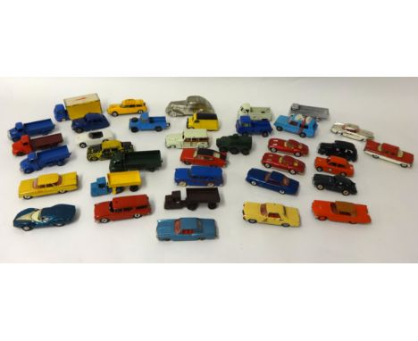 Thirty five playworn and re-painted Dinky and Corgi toys