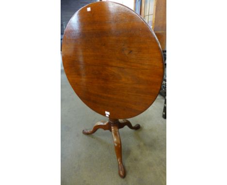 A George III mahogany circular tilt-top birdcage action tripod tea table 