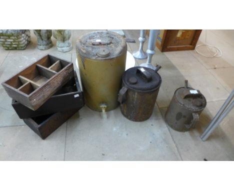 Three vintage paraffin cans and three ironmonger's wooden crates 
