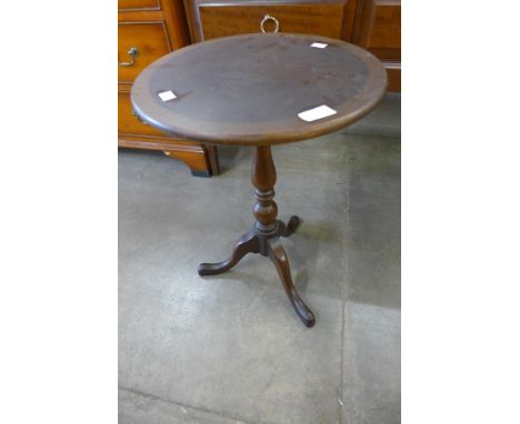 An inlaid mahogany tripod wine table 