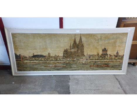 A German woollen tapestry, depicting Cologne, framed 