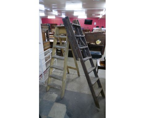 Two vintage pine stepladders 