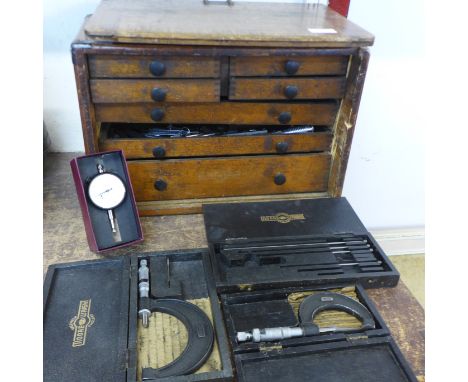 A vintage table top engineer's tool chest, with tools 