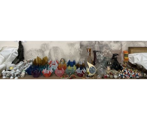 Glass handkerchief vases together with egg cup holders, glass decanters, Poole pottery dolphins, smurfs, tetley tea folk etc 