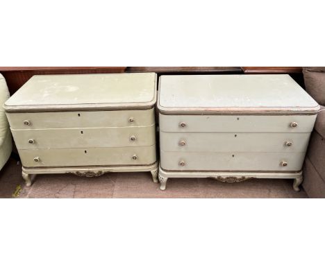 A pair of green painted chests of drawers each with three drawers on cabriole legs each approximately 98cm wide x 71cm high x