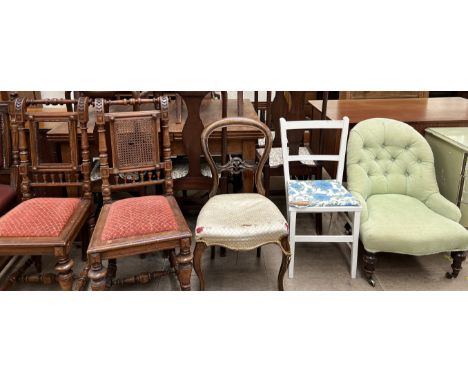 A pair of hall chairs with a caned back together with a Victorian balloon back dining chair, a button back upholstered nursin