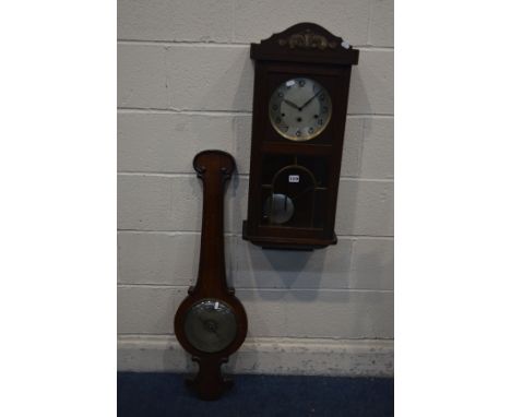 A VICTORIAN MAHOGANY WHEEL BAROMETER (missing thermometer) along with an oak wall clock (2)
