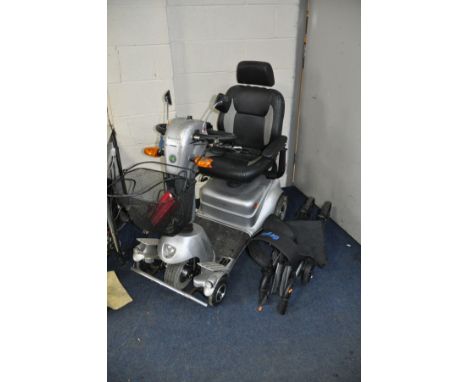 A QUINGO PLUS MOBILITY SCOOTER with charger and key (PAT pass and working ) along with a Days mobility folding aluminium disa