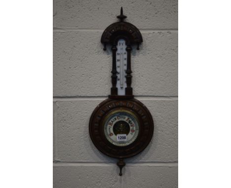 AN EDWARDIAN MAHOGANY ANEROID BAROMETER AND THERMONETER, height 57cm.