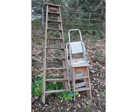 A SET OF WOODEN STEP LADDERS together with a similar smaller set, and two metal step ladders (4)