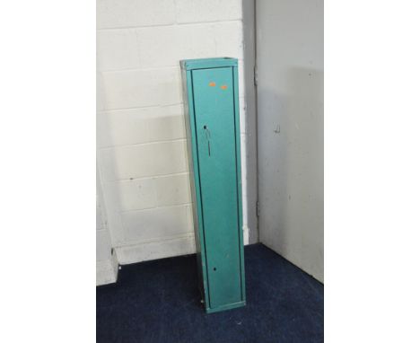 A SINGLE DOOR METAL GUN CABINET with two locks and one key per lock 23cm x 23cm x 135cm high