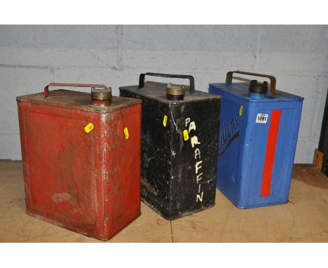 THREE VINTAGE PETROL CANS, including a refurbished Redline can with a brass Shell cap, the other two have plain brass caps (3