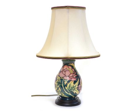 Moorcroft Table Lamp with Shade Moorcroft table lamp, green ground with pink floral decoration, turned wooden base with Moorc