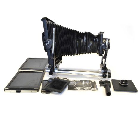 Toyo-View Large Format Camera Toyo-View large format camera supported on a monorail with dark slides and other accessories