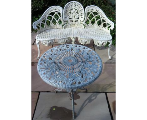 Vintage piercework decorated garden bench with small similar circular table. Bench Approx. 86 x 135 x 42cms

reasonable used 