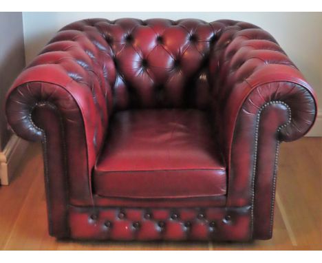 Vintage Ox Blood red leather button back Chesterfield armchair. Approx. 69 x 107 x 83cms

reasonable used condition with wear