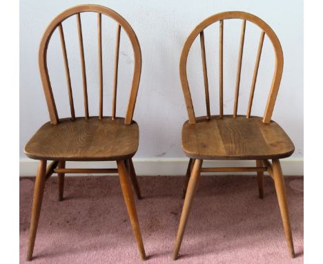 Pair of Ercol mid 20th century stick back dining chairs

used condition with minor scuffs and scratches etc 