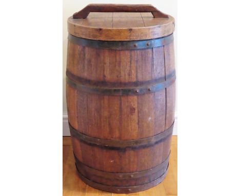 Large metal bound vintage drinks barrel with cover. Approx. 87 x 50cms

reasonable used condition with wear due to age 