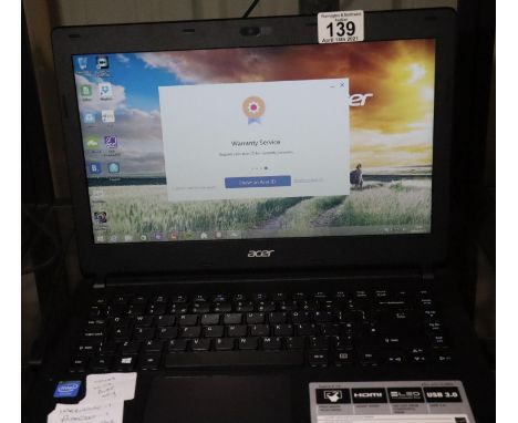 Acer laptop ES1-411 series model number PA-1450-26 with charger. P&P Group 3 (£25+VAT for the first lot and £5+VAT for subseq