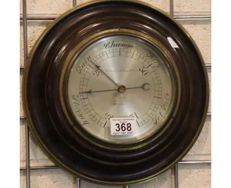 Fattorini and Sons, early 20thC mahogany framed aneroid barometer with silvered dial, overall D: 28 cm. P&amp;P Group 3 (£25+