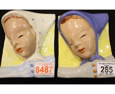 Two Austrian Art Deco glazed terracotta wall plaques in relief, each 14 x 12 cm. P&amp;P Group 2 (£18+VAT for the first lot a
