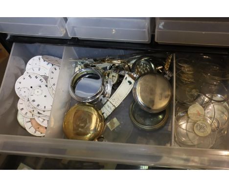 Cabinet containing a quantity of pocket watch parts. P&amp;P Group 1 (£14+VAT for the first lot and £1+VAT for subsequent lot