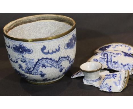 Small Oriental blue and white pot with four character marks to the base with damaged (but believed complete) cover. P&amp;P G