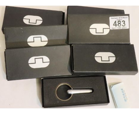 Seven boxed new old stock TRUE keyrings. P&amp;P Group 3 (£25+VAT for the first lot and £5+VAT for subsequent lots) 