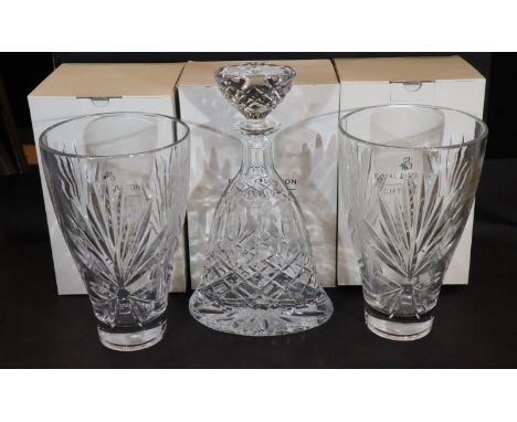 Royal Doulton giftware, two boxed crystal vases in the Keswick design and a boxed dress design decanter with stopper. P&P Gro