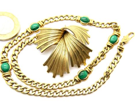 Yellow metal malachite set bracelet and a yellow metal brooch.  P&amp;P Group 1 (£14+VAT for the first lot and £1+VAT for sub