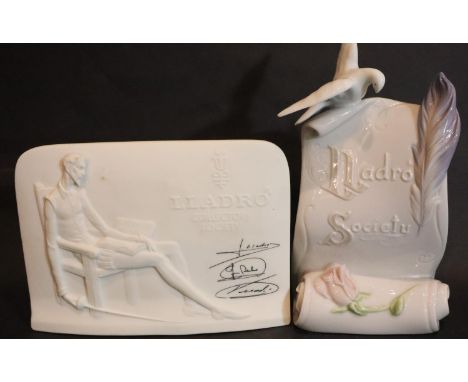 Lladro Society glazed scroll form plaque, H: 17 cm with a Lladro bisque collectors society plaque. P&P Group 2 (£18+VAT for t