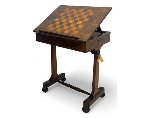 Mid-19th century rosewood games table, rectangular top inlaid with a chessboard, adjustable on a brass ratchet easel support,