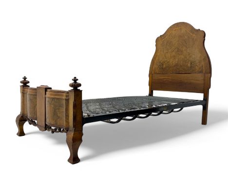 Mid-20th century walnut single bedstead, high shaped headboard, footboard with turned finials and scrollwork carvings, comple