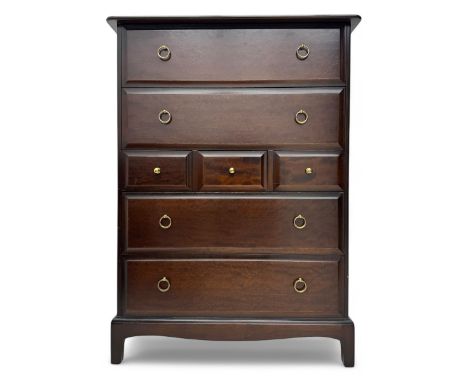 Stag Minstrel - mid-20th century chest, rectangular top over arrangement of three short and four long drawers, on bracket fee