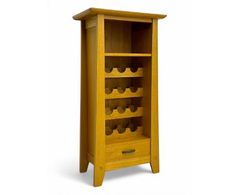 Contemporary light oak wine cabinet, rectangular overhanging top above an open shelf, fitted with four bottle racks each hold