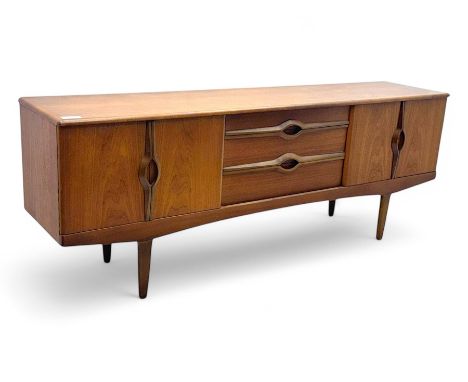 Stonehill - mid-20th century teak sideboard, three central drawers flanked by concertina cupboard doors, on tapering supports