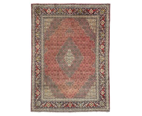Perisian Bidjar crimson ground rug, within scalloped borders, central pole medallion, the field decorated all over with flora