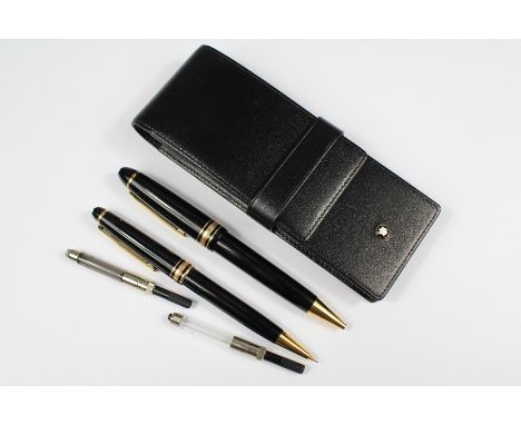 Mont Blanc Meisterstuck Roller Ball Pen and Pencil Set. The pen and pencil in black with gilt trim approx 14 cms, in leather 