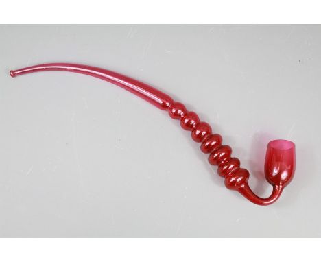 A Victorian Cranberry Glass Novelty Pipe. The pipe approx 43 cms.