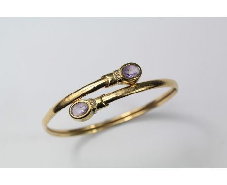 A 9ct Gold Amethyst and Diamond Bangle