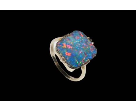 White gold and black opal ring.