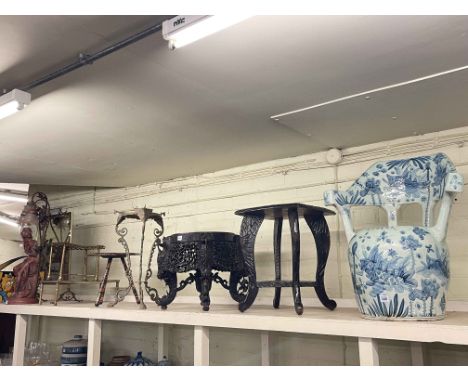 Oriental carved wood stand, carved table, blue and white pottery chair, brass mirrored firescreen, two brass stands, painted 