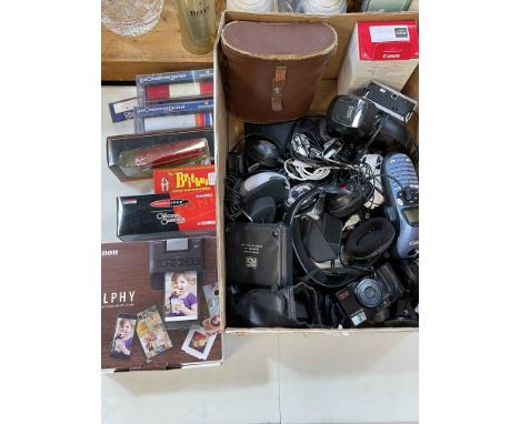 Collection of camera equipment, model buses, binoculars, etc.