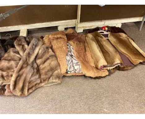 Collection of vintage fur coats.