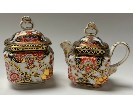 A Derby Crown Porcelain Company Imari palette 383 pattern sucrier and cover and cream jug and cover, printed marks, c.1890 