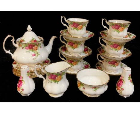 A Royal Albert Old Country Roses pattern teapot, milk jug and sugar bowl, six teacups, six saucers, six tea plates, an associ