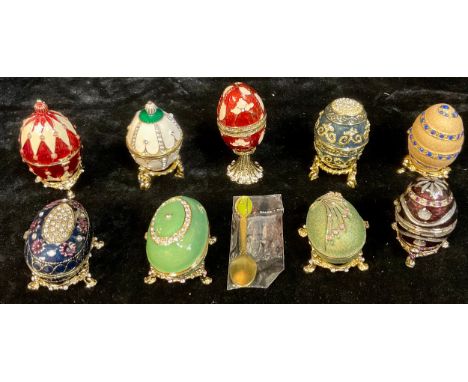A set of nine Atlas Editions reproduction Fabergé Eggs on stands, including Lilac Flowers, paperwork, boxed; etc, each approx