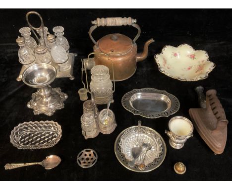 AN EPNS six bottle cruet set on stand; an early electric copper kettle; an EPNS comport with Crescent China shaped circular d
