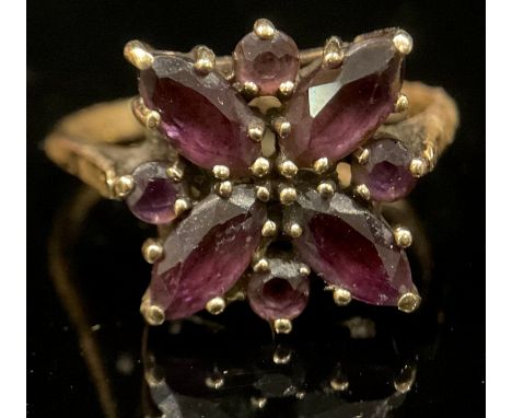 A 9ct gold Amethyst flower head cluster ring, size T/U, 3.9g 